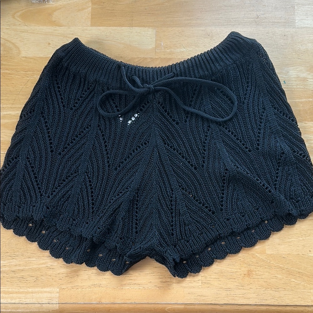 Black Crochet Shorts with Intricate Knit Design. New without tags. Size large.
